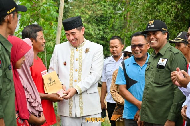 Bupati Dendi Ramadhona Hadiri Penyerahan Bantuan Bedah Rumah Layak Sehat untuk Masyarakat Desa Sidodadi dan Gunung Sugih